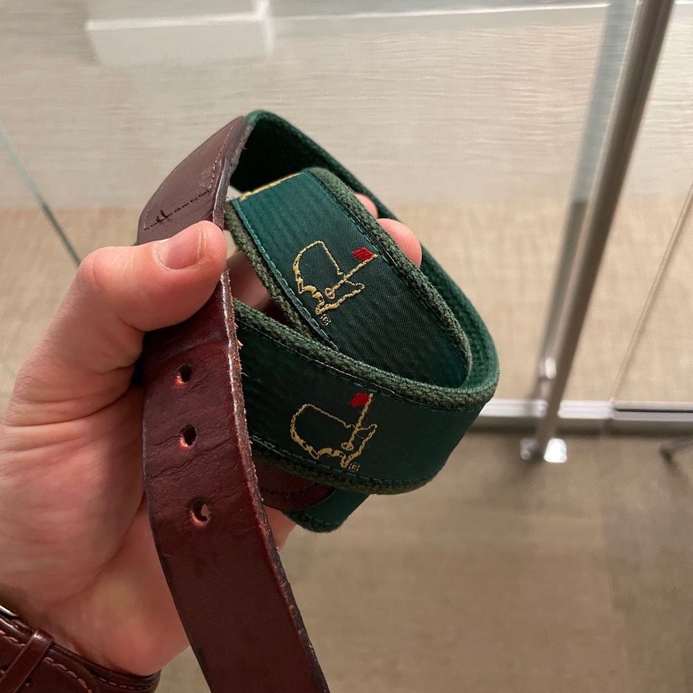 Leather and ribbon THE MASTERS belt.